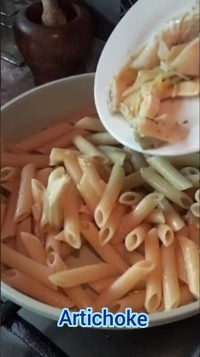 Garlic Penne Pasta with artichoke and baby spinach #pennepastarecipe #creamypasta