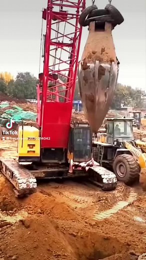 Humorous Construction Crane Fails to Lift Heavy Object