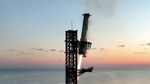 SpaceX catches Starship rocket booster in dramatic landing during fifth flight test