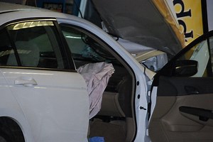 Car Crashes Into Exxon Station