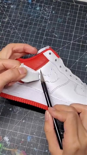 Angelus Direct | Paints, Dyes, Cleaners for Shoes & More on Instagram: "Psycho Energy: ON ✅ Angelus Energy: ON ✅ For fans of Dandadan and custom art, @customsbyshelly delivers a standout piece using Angelus Paints. 👀 How do I avoid ruining the shoe when taking the swoosh off? 🔧 Go slow! ➡️ Gently lift the swoosh using a seam ripper or precision blade ➡️ Peel slowly to avoid tearing the surface ➡️ Clean off leftover glue with Angelus Preparer & Deglazer 🛠 Filling holes? Use Angelus paintable r