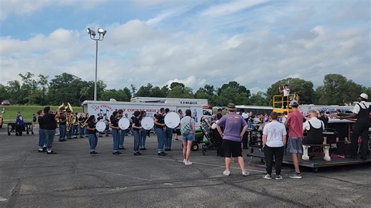 Marion Marching Giants warming up at Muncie Central! Due to the weather, the performance schedule was moved up an hour. | Chronicle-Tribune