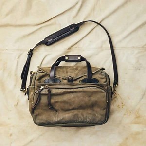 Industrial-strength Rugged Twill. The toughest luggage you’ll ever own. | Filson