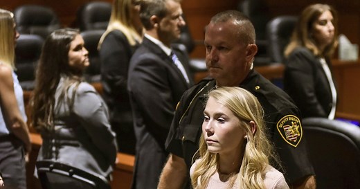Ohio ex-cheerleader found not guilty of killing newborn daughter she buried in backyard