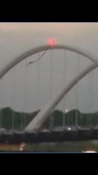 Activist remains perched atop DC bridge protesting Iran war, AI development