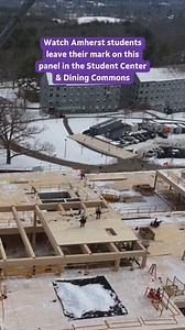 Our students are now permanently a part of the new Student Center & Dining Commons. 🫶 On Feb. 11, 2025, a special wooden panel filled with hundreds of student signatures was lowered into the construction. The SC/DC will house the new student dining hall, resource centers, event rooms, study spaces and more. Set to open in 2026, it will function as a place where students can come together to recharge, reflect, create and connect. https://bit.ly/4aZYUgJ. | Amherst College