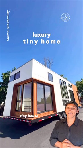Would you live in this stunning 39' x 11' modern tiny home? 🌞✨ Meet the "Urban Park Max" by TruForm Tiny—a beautifully crafted home on wheels that blends luxury, functionality, & off-grid capability. This model is heading to its new owner in North Carolina! 🍒 Cherry countertops hickory flooring 🛁 Large soaking tub towel warmer 🪟 Black white checkered tile in bathroom ☀️ Off-grid electrical solar system 🪜 Lighted stair treads spacious loft 🌿 Natural light throughout 🚪 Private entrance in t