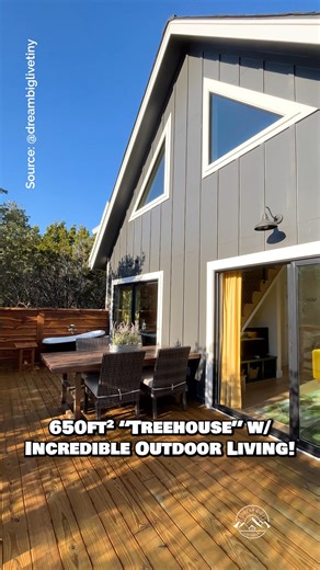 Would you live in this 650-sqft jungle-themed "treehouse" built on stilts with an incredible outdoor living setup? Comment TREEHOUSE & I'll message you the full video tour! Inside, this small home features a spacious floor plan with a living room, a kitchen with full-size appliances, a main-floor bedroom with a full-size closet, a beautiful bathroom with a tile shower & soaking tub, as well as an additional loft space that serves as a guest bedroom or an office! The best part in my opinion is th