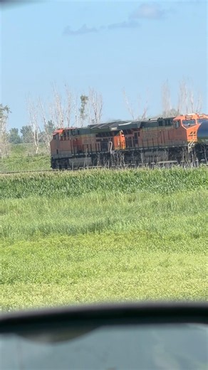 While parked at an exit in Iowa caught a BNSF tank train ￼.