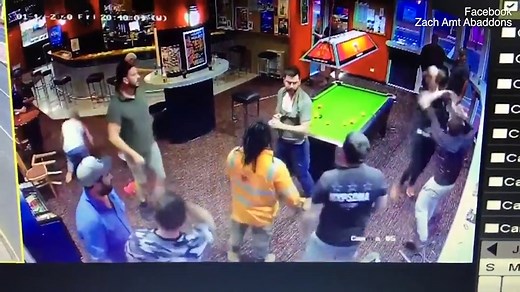 Pool cues and chairs thrown as bar fight spills onto streets
