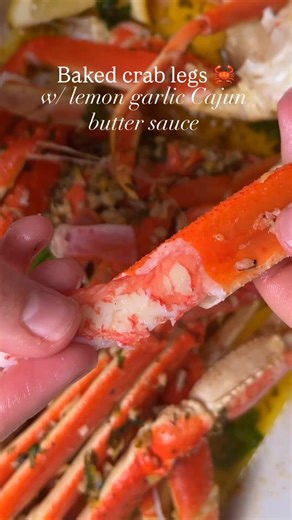 Baked snow crab legs with lemon garlic Cajun butter! 🦀🧈🧄 Recipe is linked in the comments! You'll never want to order crab legs at a restaurant again after you try baking them yourself with a garlicky, lemon Cajun butter sauce. 😜 We love saving a few bucks and making something impressive at home. They're SO simple to make, and perfect for the holidays! 🎄 We don't love boiling snow crab, and instead, we just add a super flavorful butter sauce to them in a baking dish, cover them, and bake th