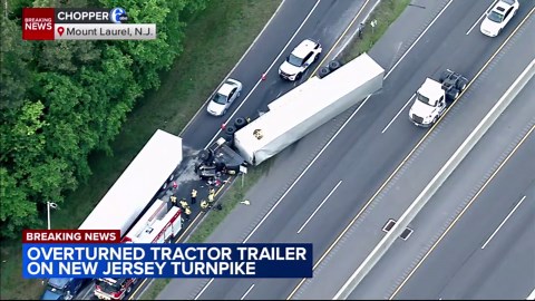 Tractor-trailer overturns on RT-73 ramp to New Jersey Turnpike NB in Mt. Laurel Township
