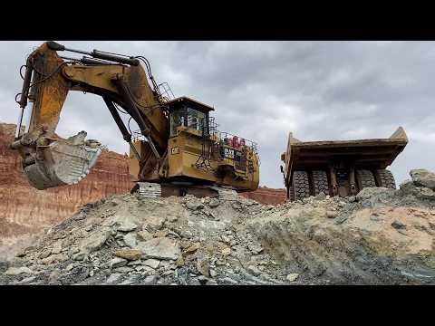Huge Caterpillar 6040 Mining Excavator Loading Hitachi EH3500 Dumpers - Operator View