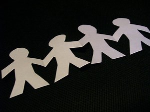 Create Beautiful Paper Doll Chains with Ease | LoveToKnow