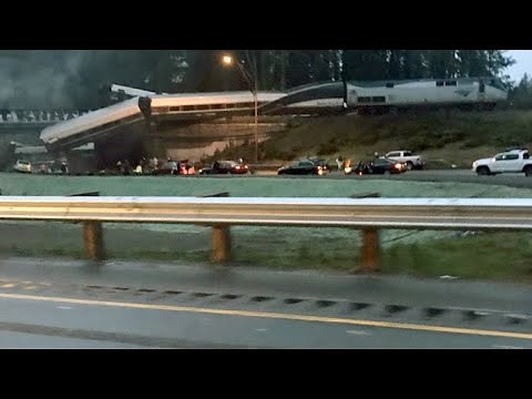 Amtrak train derails, dangles over interstate in Washington