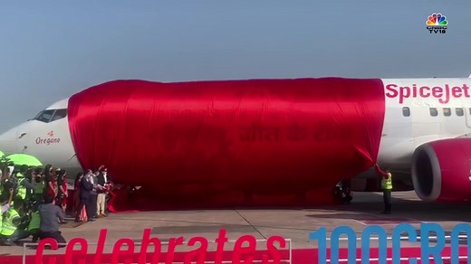 53K views · 1.1K reactions | #VaccineCentury | #SpiceJet unveils special aircraft livery to celebrate achievement of 100 cr #COVID19 vaccination drive. Mansukh Mandaviya Jyotiraditya M Scindia FlySpiceJet Delhi AirportAnu Sharma #100CroreVaccination #VaccinationUpdate #CovidVaccines #COVIDGroundZero #Vaccine #Covid_19 | CNBC-TV18 | Facebook