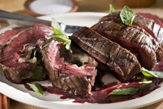 Red Wine Marinated Flank Steak Filled with Prosciutto, Fontina and Basil with Cabernet-Shallot Reduction