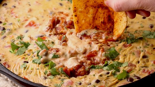 100K views · 605 reactions | RECIPE: https://www.thecookierookie.com/loaded-cowboy-queso/ Rotel Dip (Loaded Velveeta Cheese Dip) is the ultimate Super Bowl appetizer. This EASY Rotel Dip recipe is loaded with Velveeta, beer, pepper jack, black beans, Rotel, and sausage! For me it just doesn’t get better than this creative Velveeta queso recipe. | The Cookie Rookie | Facebook