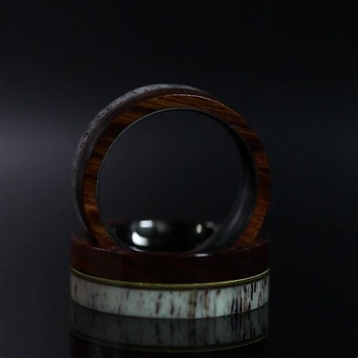 Description: Introducing the symphony of nature's beauty and musical spirit - the 8mm Men's Guitar String, Deer Antler & Ironwood Tungsten Ring. Prepare to be entranced by the extraordinary fusion of raw elegance, artistic flair, and natural allure, where the soulful essence of a guitar string meets the timeless charm of deer antler and the rich warmth of ironwood, against the bold backdrop of tungsten. Unleash your inner artist with this exceptional ring that celebrates your passion for music, 
