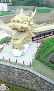 38K views · 1.3K reactions | Dubbed the world's longest dragon statue, a 999-m-long dragon-shaped corridor stretches along the Feilong Lake in SW China's Guizhou Province. | People's Daily, China | Facebook