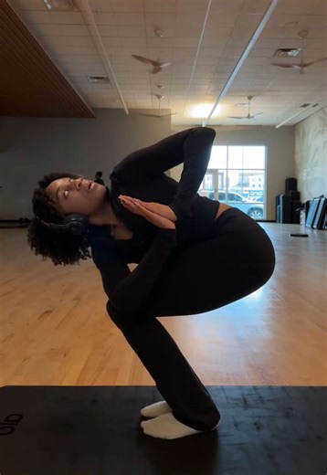 Revolved chair pose.