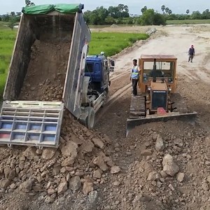 16K views · 339 reactions | Land Reclamation Construction Process Mini Dozer pushing Dirt Vs 5ton Dump Truck Unloading Dirt Source : Mr Machines at YouTube channel | Alat Berat Mania | Facebook