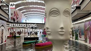 Retailers using luxury to draw mall shoppers