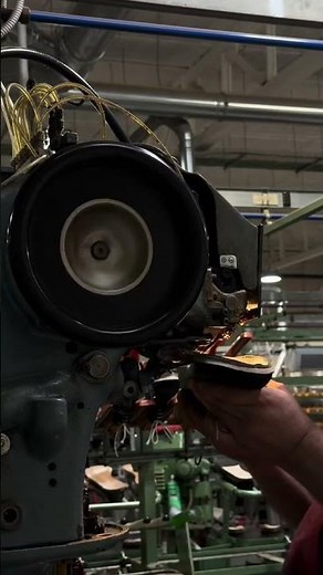 An artisan shoemaker performing a Goodyear welting process on a leather shoes | Carmina Shoemaker