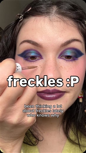 Giovanna🧚🏼‍♀️ on Instagram: "“Shane Hollander freckles” has been gracing my Google searches a LOT😊 @glisten_cosmetics taupe speckled pen is my FAV faux freckle makeup product! GIOVANNA20 for $ off (affiliate)💜 The tutorial for this colorful eyeshade look using the @lethalcosmetics x SpongeBob movie palette is already posted!🫶🏻 #fauxfreckles #frecklemakeup #shanehollander #heatedrivalry"