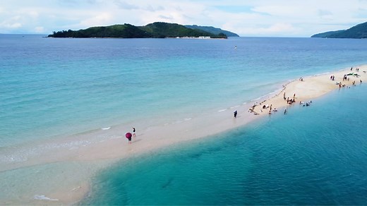 2.9K reactions · 1K shares | Bonbon Beach on Romblon Island in the Philippines is one of the most beautiful stretches of sand in the world. It's definitely the best beach in the Romblon Province and the sandbar makes it an iconic location in the region. #Romblon #BonbonBeach #itsmorefuninthephilippines | KAJUANDER | Facebook