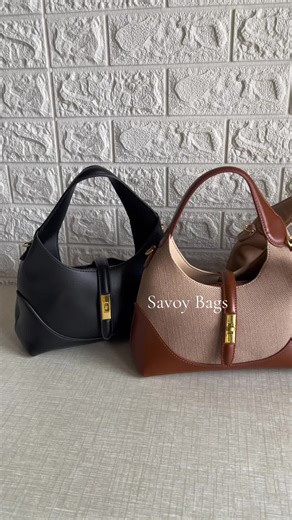 Elegant Crescent Handbag with Gold-tone Clasp