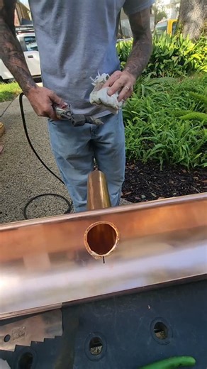 Josh on Instagram: "Soldering a spout into a custom 6 inch copper quarter round gutter. #soldering #custom #handmade #copper #gutters #customgutters #coppergutters #copperwork #handwork #bluecollar #roofersofinstagram"