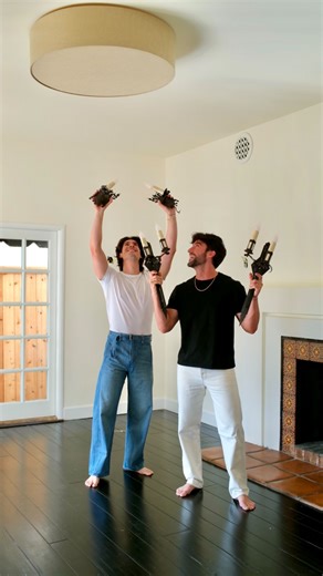 We’re finally beginning to design the living room in our 100-year-old Spanish Revival house after spending a year renovating it 😅😬 starting with these antique iron sconces from the 1920s and a brick red rug to anchor the room. We didn’t initially agree on both pairs of sconces, but now that they’re up, we love how they look together and the character to the space. We still need to agree on a chandelier, a sofa, curtains, and where to put the Christmas tree… but for now, we’re relishing in the 