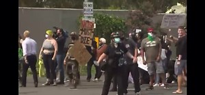 14K views · 146 reactions | VIEWER DISCRETION ADVISED: A car with California Highway Patrol markings was seen driving off with a man on the hood at a protest in California, following two other incidents where people were hit by vehicles. | KNAB News 1 | Facebook