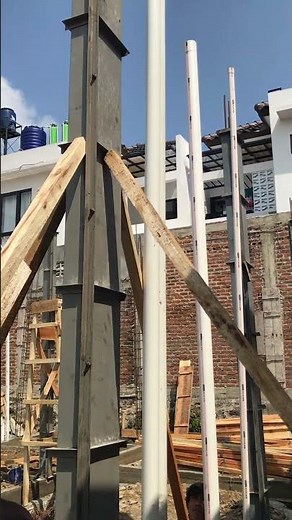measuring the straightness of a column using a plumb line#for #construction