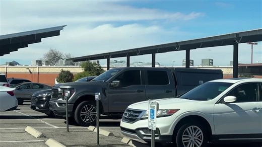 Law enforcement officials seen walking into sheriff's headquarters