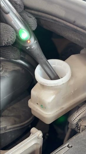 How can I tell if the brake fluid is in good condition?