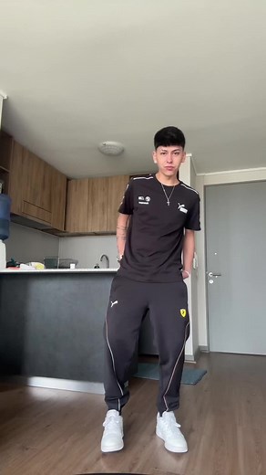 Dynamic Dance Moves in a Modern Kitchen Setting