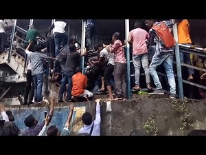 Mumbai stampede: at least 22 killed in fatal rush-hour crush – video report