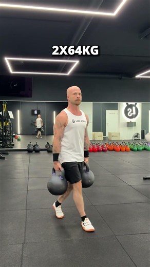 A True Farmer's Carry with Two 64kg Kettlebells!