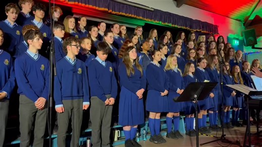 Our school choir signing in Latin at our Carols By Candlelight - Dona Nobis Pacem, meaning Grant Us Peace 🎼🕯️ | St. Joseph's Secondary School