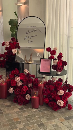 The gorgeous color palette brought everything together, creating a vibrant and elegant atmosphere that truly captured their love and celebration. #wedding #couple #reception #redroses #candles #weddingdecor #luxurywedding