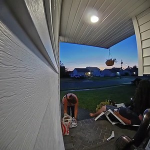 Guy Sitting on Porch Falls as His Chair Breaks