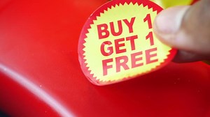 Download buy 1 get 1 free offer sticker and prodcuts on table for free