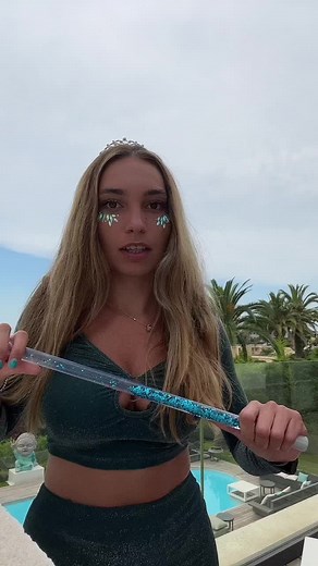 Poolside Celebration with Colorful Outfits and Sparkly Fun