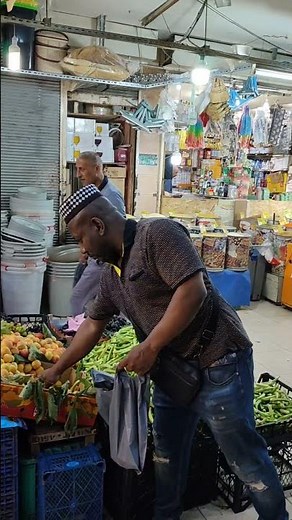 Incredible Moment: Monkey Buys Meat at the Market