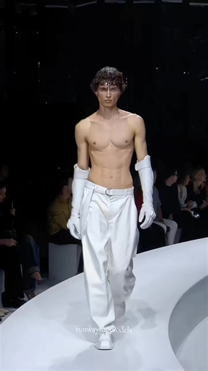 The male runway model reminds me of the video game character named Jin Kazama #foryoupage #fyp #catwalk #runwaymodel #viral