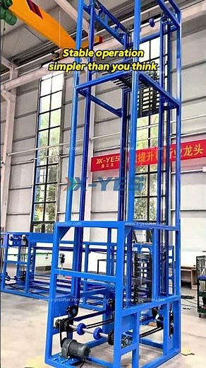 Continuous Vertical Conveyor | 4m Carton Lift with Chain Guide Rails