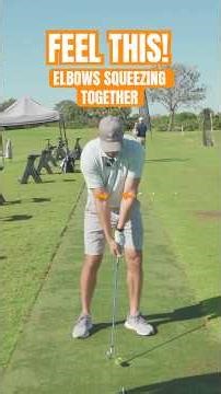 Try This Elbow Squeeze Feel (Game Changer) #shorts #golf #golfswing #golftips #golfer #ericcogorno