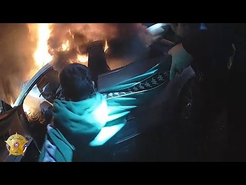 Caught on camera: Houston man trapped in burning car is rescued just in time